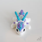 Cute articulated unicorn figure with pastel blue and purple details