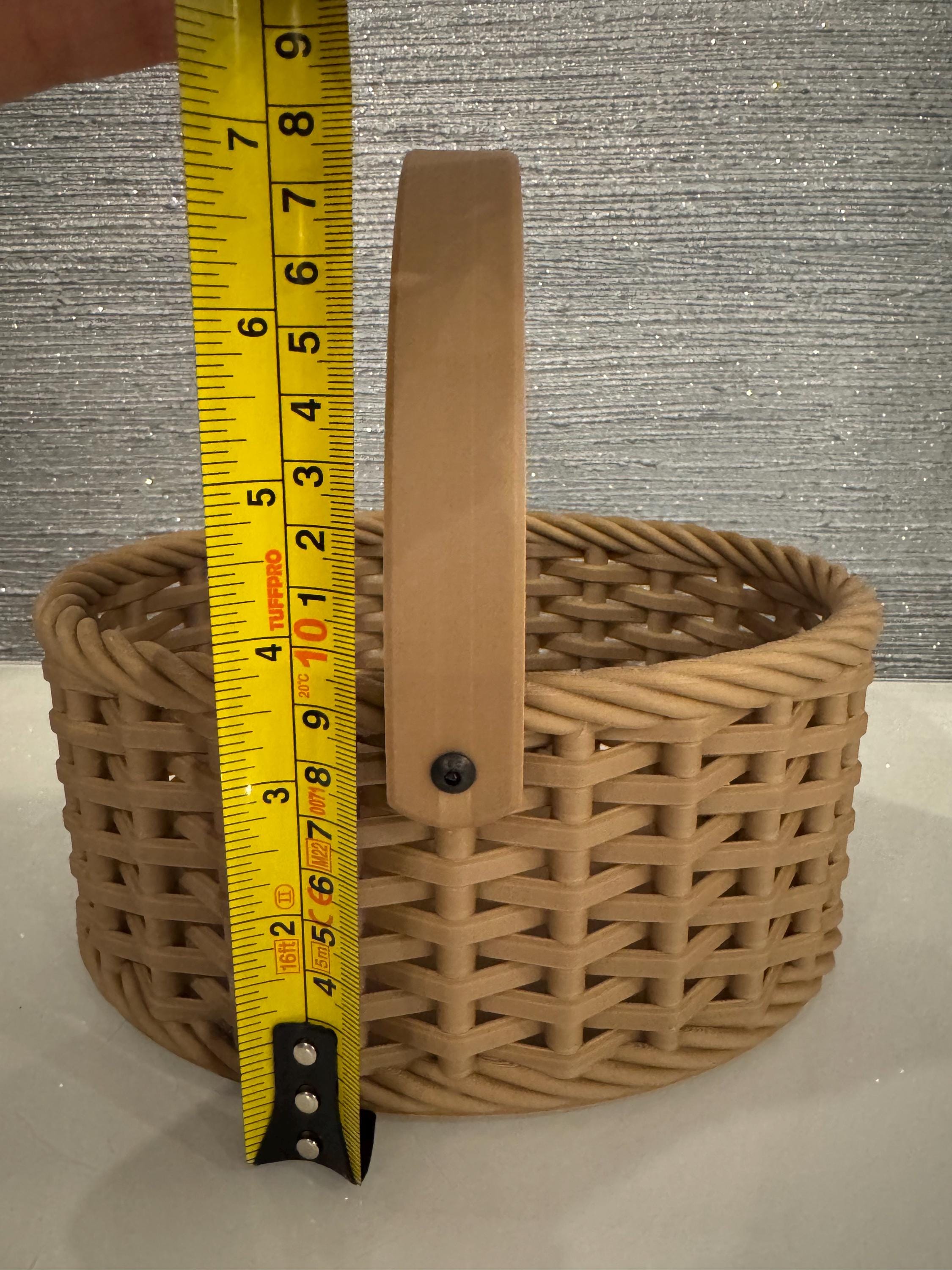 beige woven basket next to measuring tape for scale