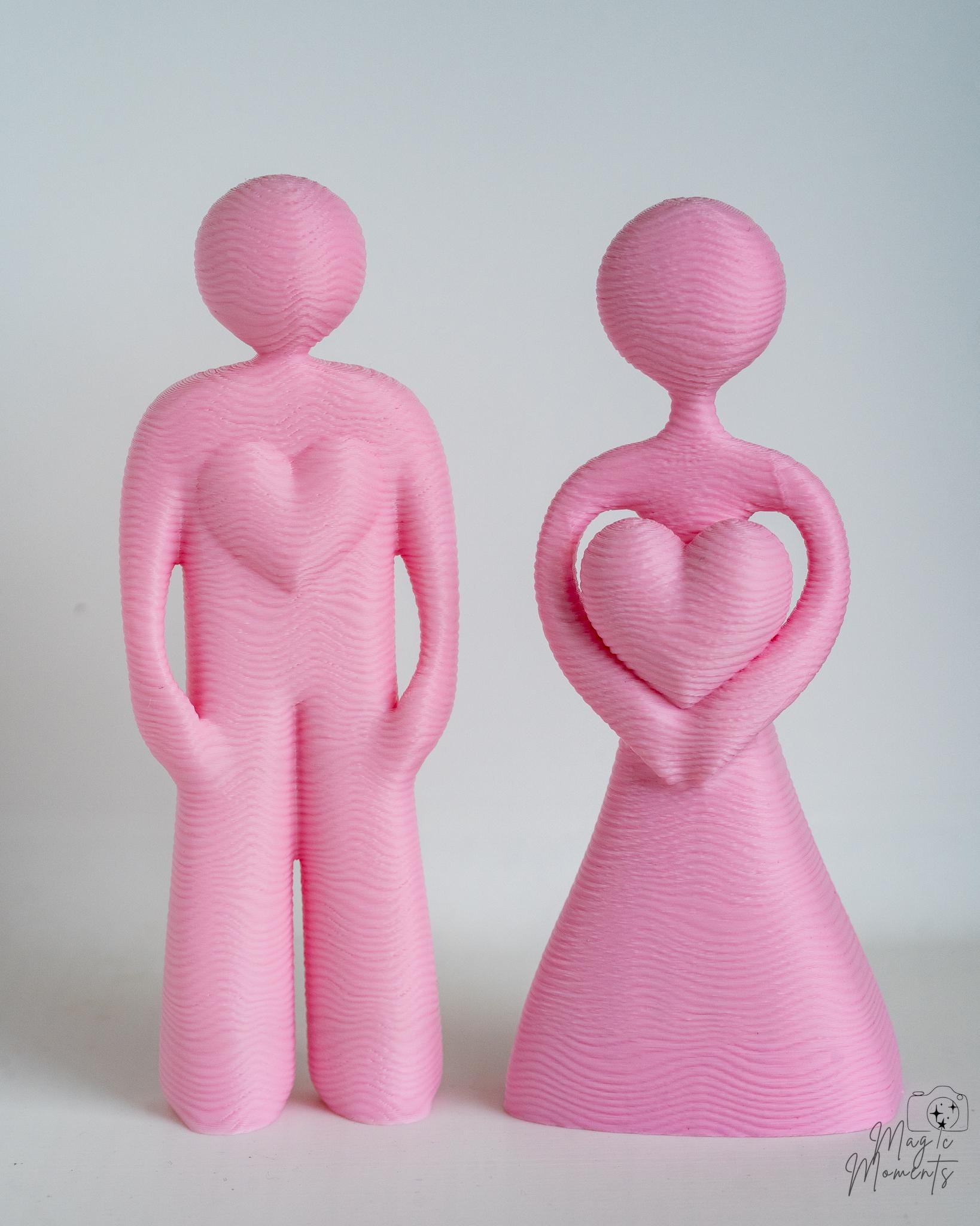 pink couple statue set