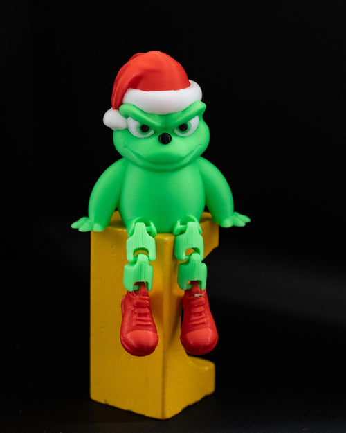 Green Christmas character shelf sitter on decorative block display