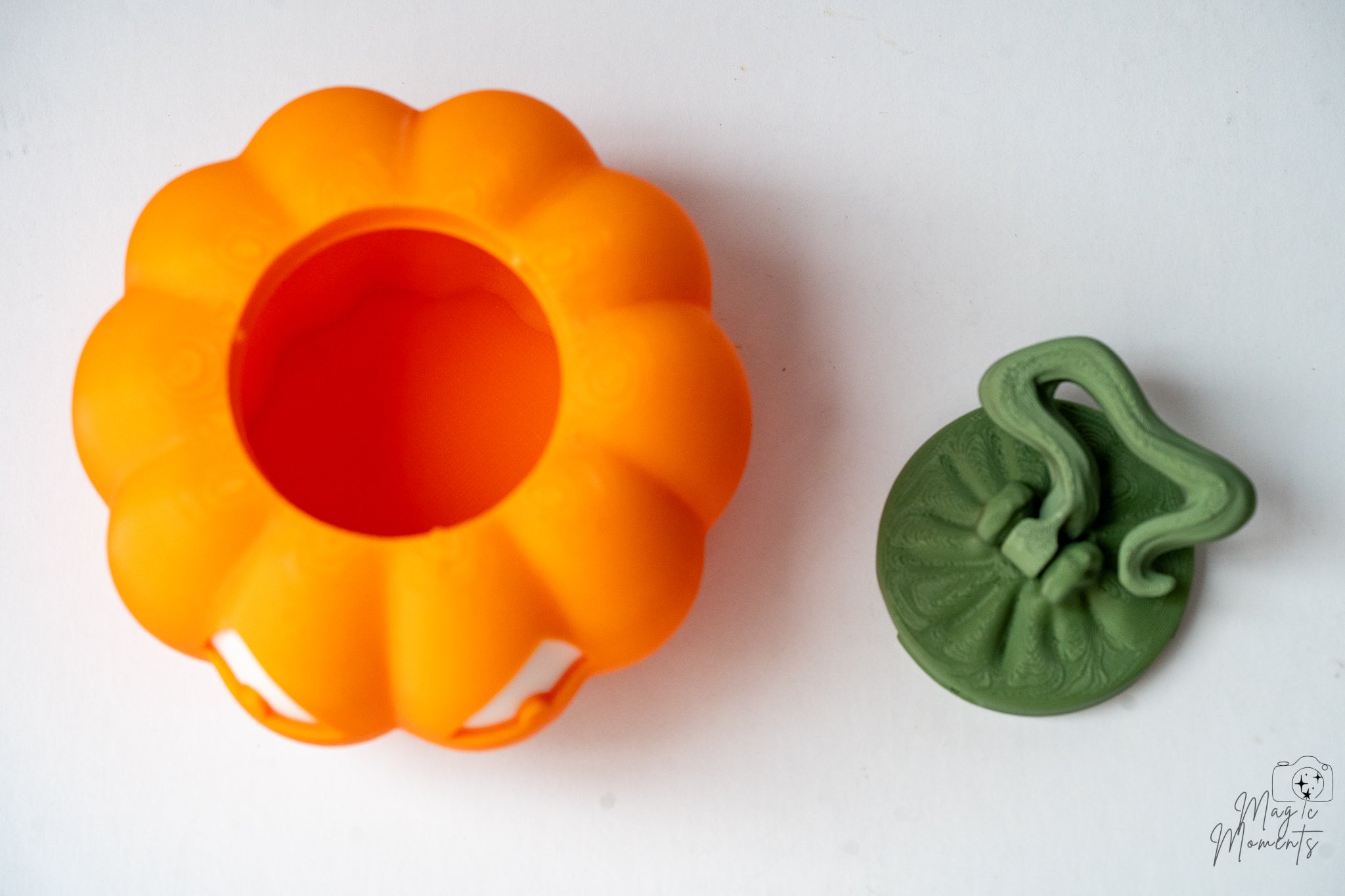 3D printed pumpkin storage box with removable lid and spooky jack o lantern face for Halloween décor