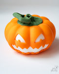 3D printed pumpkin storage box with removable lid and spooky jack o lantern face for Halloween décor