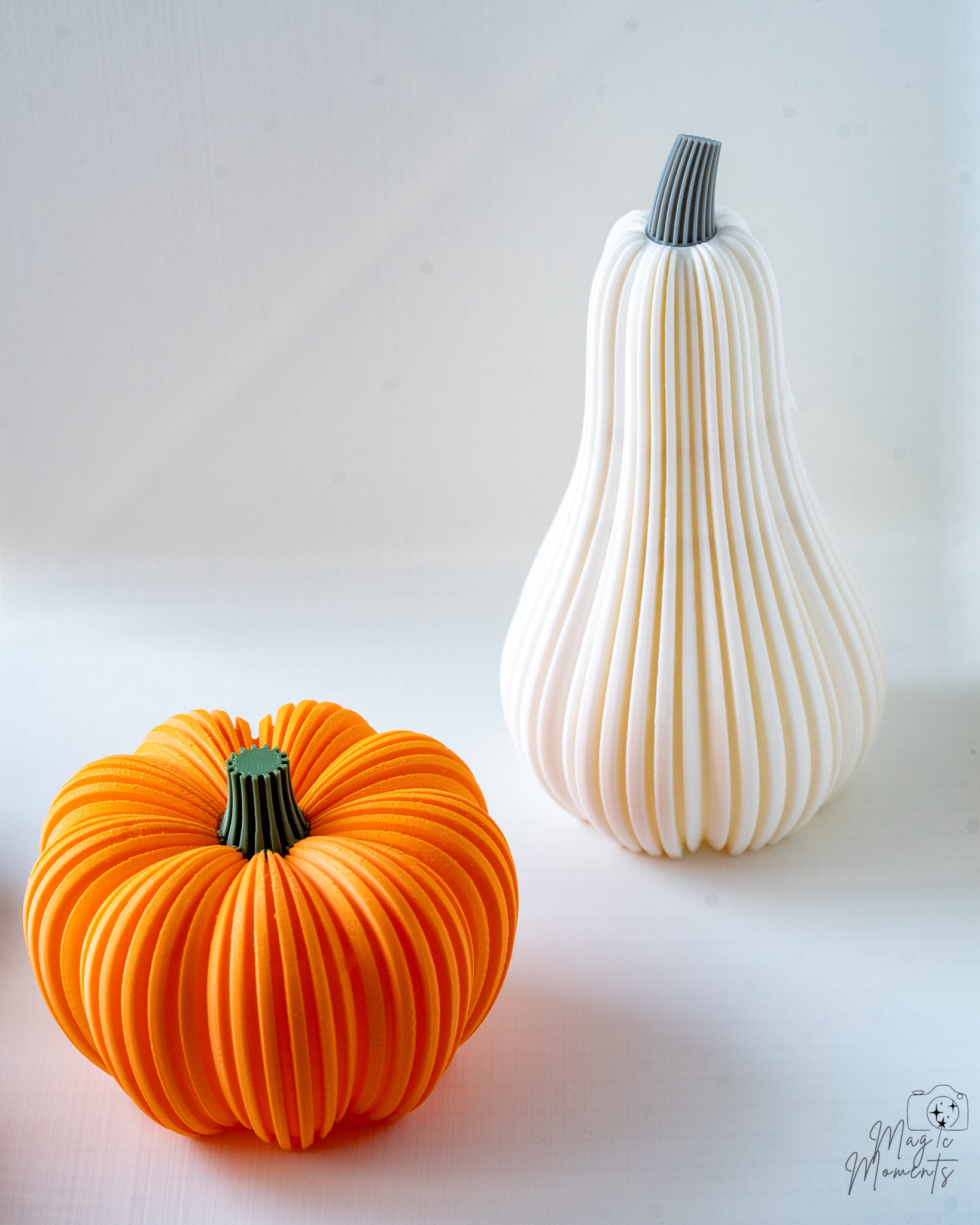 Orange pumpkin holder with White squash tealight holder