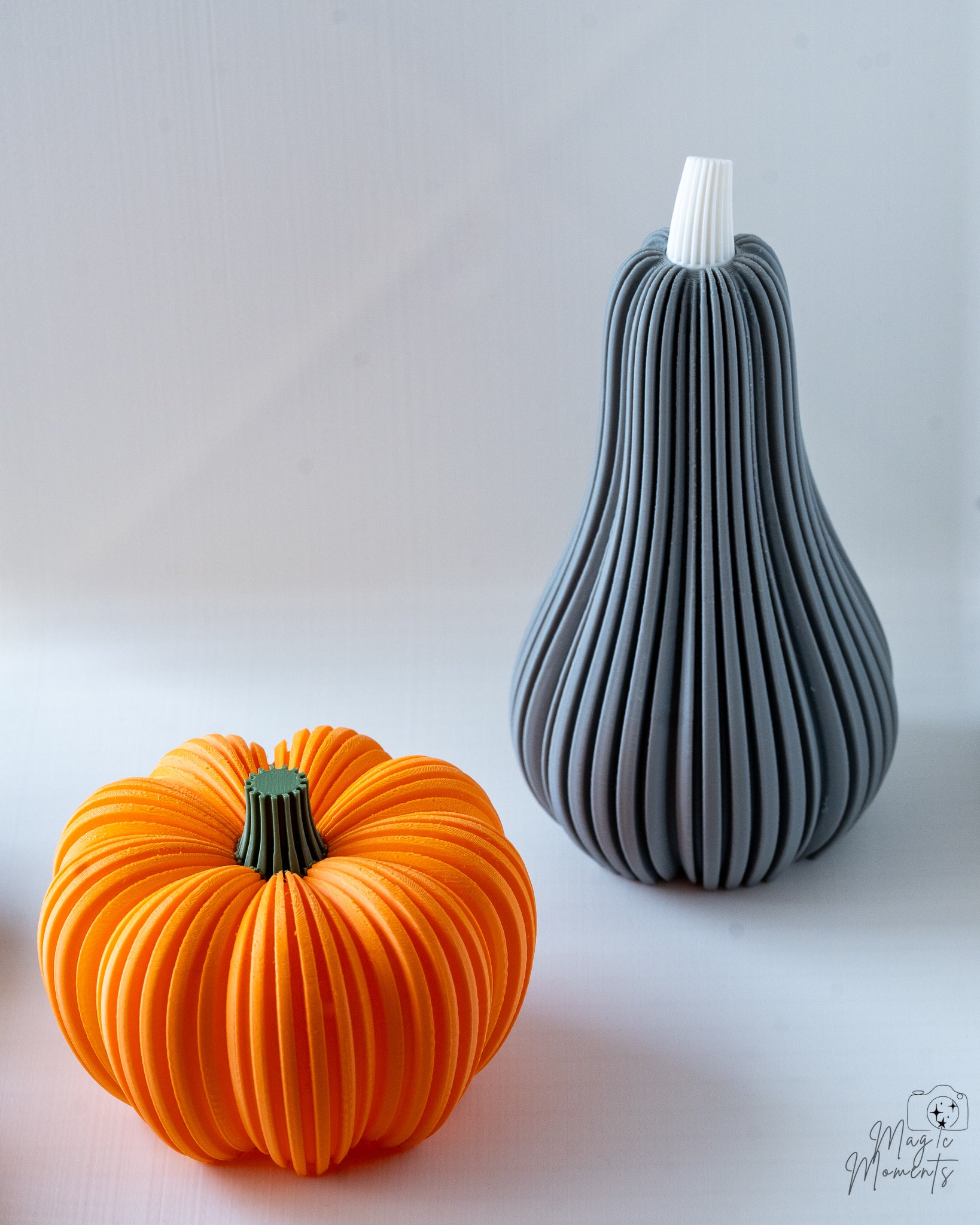 Orange pumpkin candle holder with grey squash holder