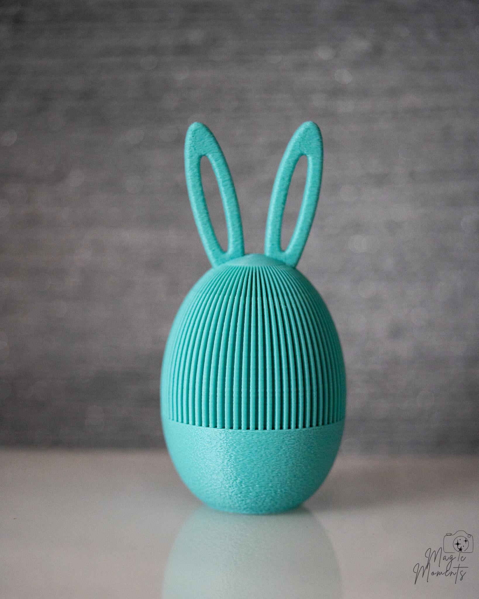 Turquoise Easter egg container with rabbit ear lid
