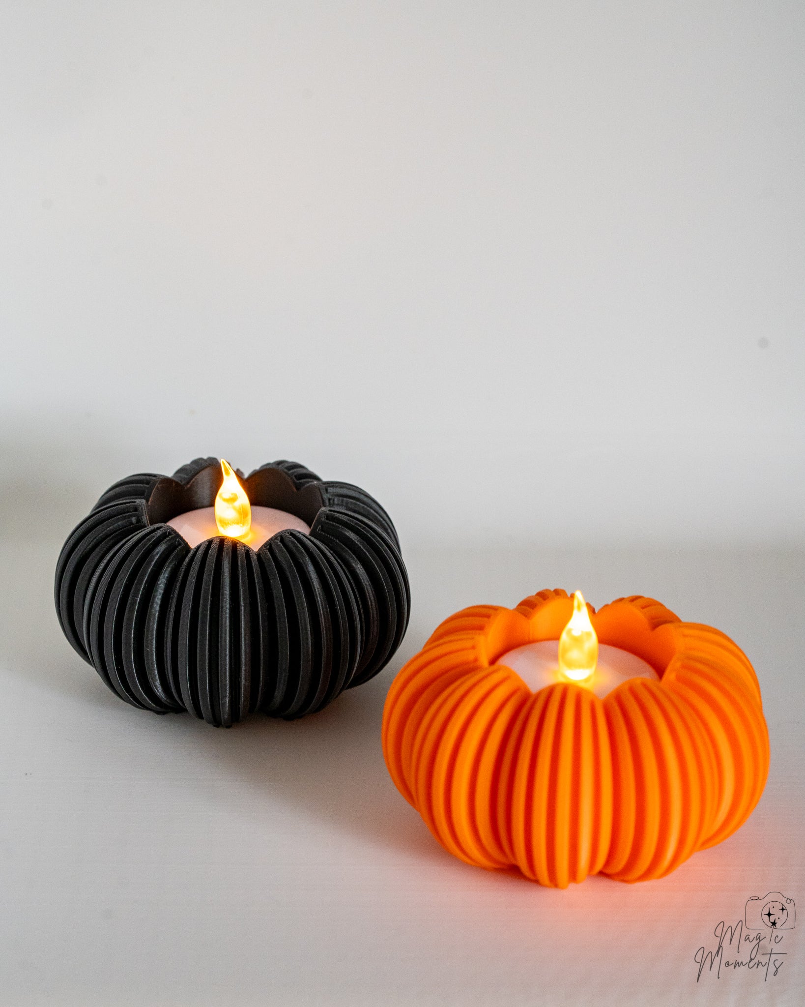 Black and orange pumpkin candle holders