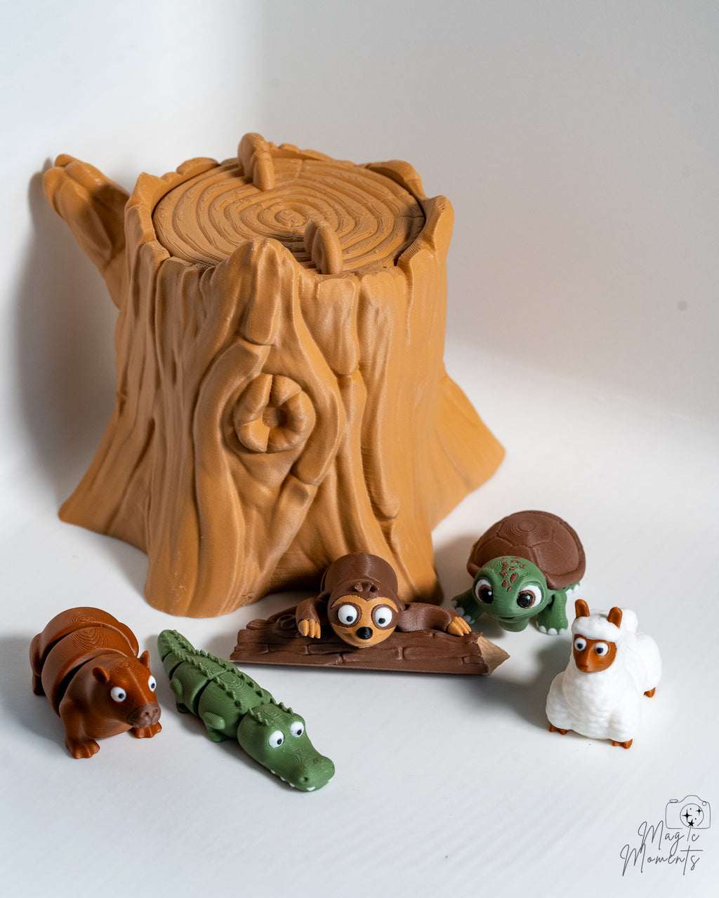 Mini animal figures with tree stump container