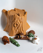 Mini animal figures with tree stump container