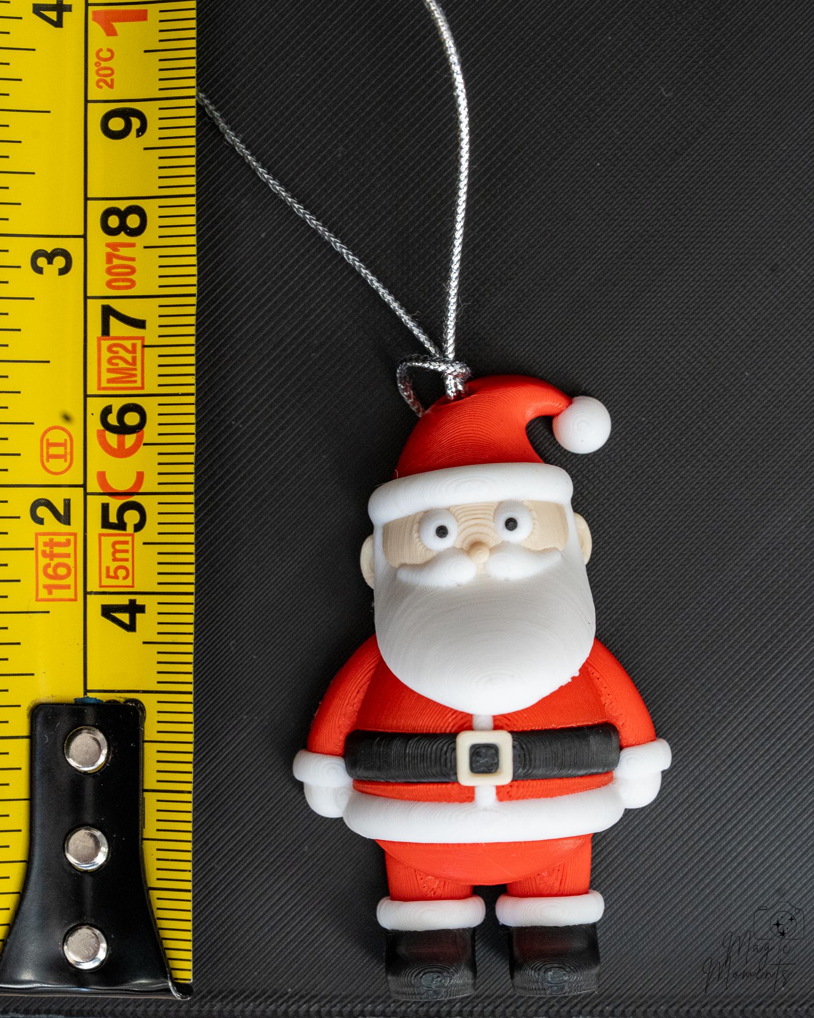 Santa ornament next to measuring tape for scale