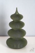 Green spiral Christmas tree decoration with modern festive style