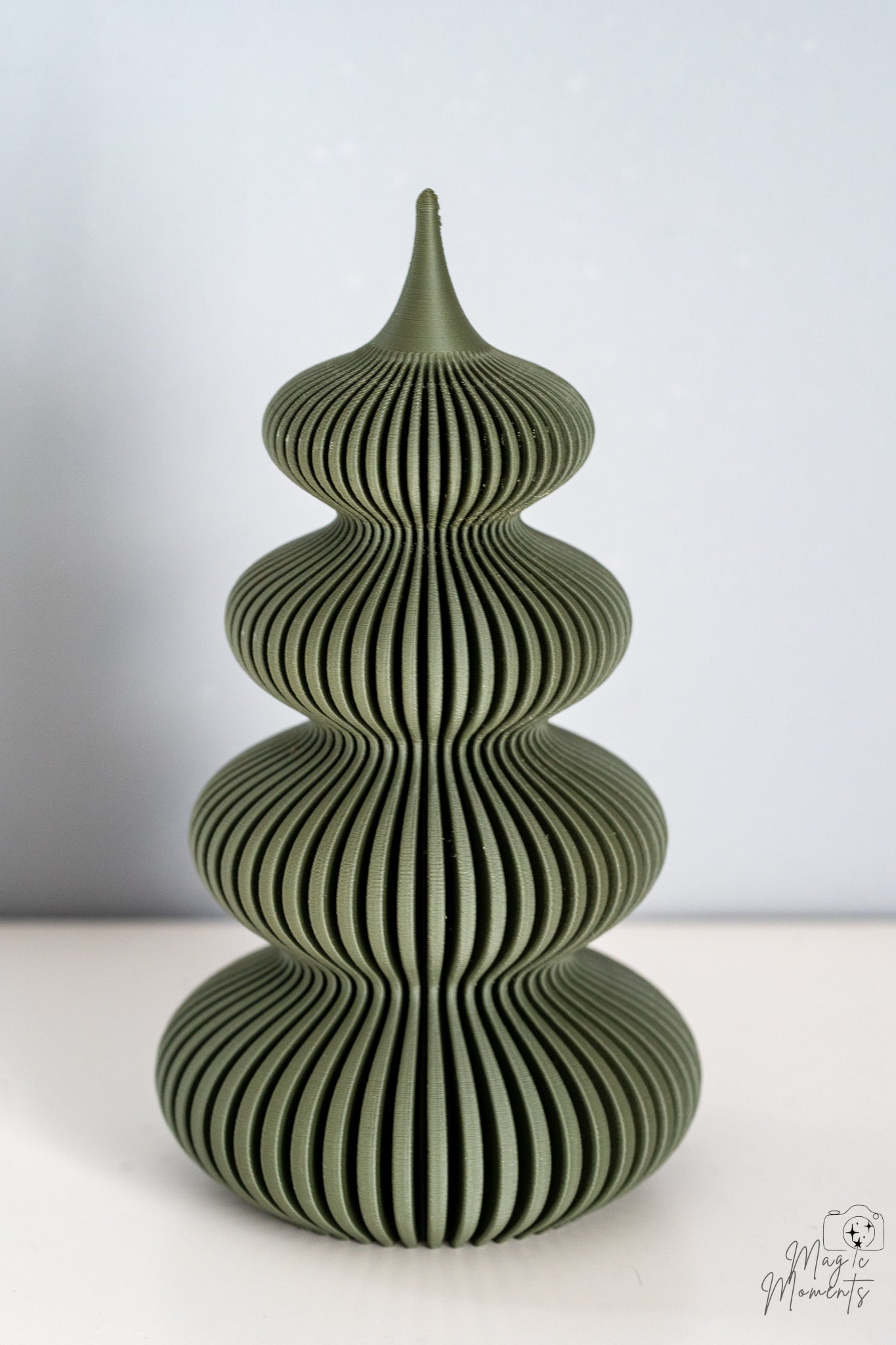 Green spiral Christmas tree decoration with modern festive style