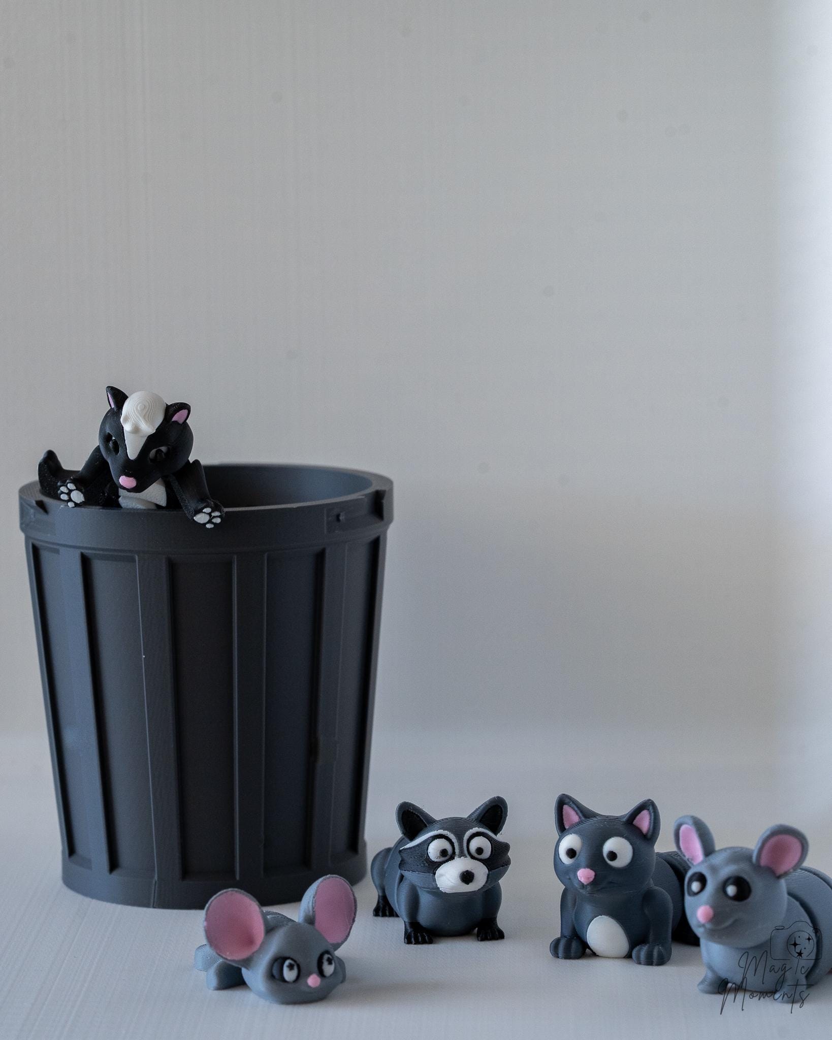 3D printed trash animal collection with cartoon style figures and bin decoration