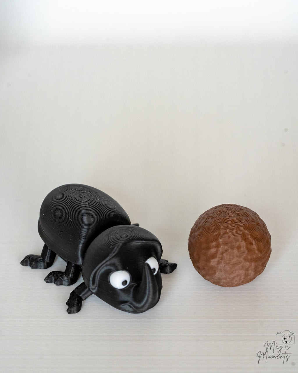 Cute articulated beetle figure with realistic textured shell design