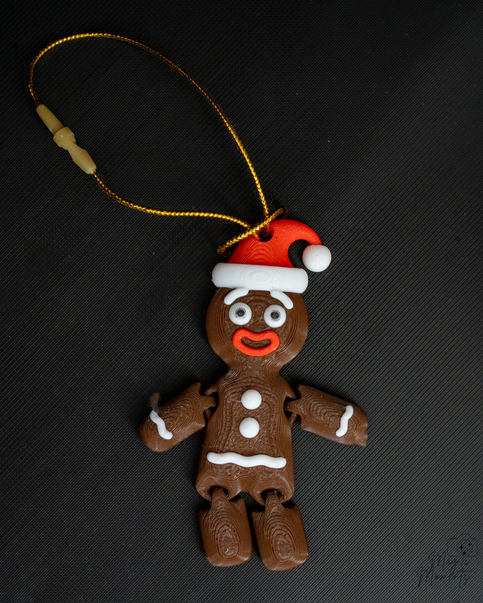 Mini gingerbread ornament with Santa hat and hanging loop