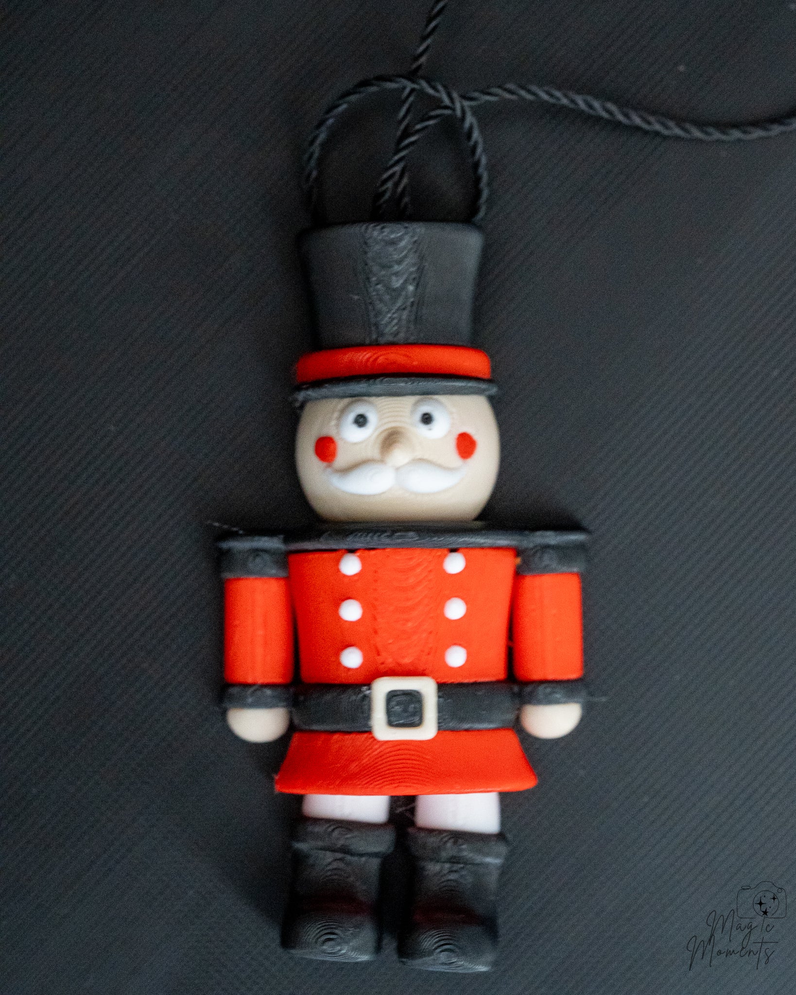 Nutcracker style Christmas ornament with hanging loop