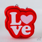 Love text clicker with red and white Valentine design