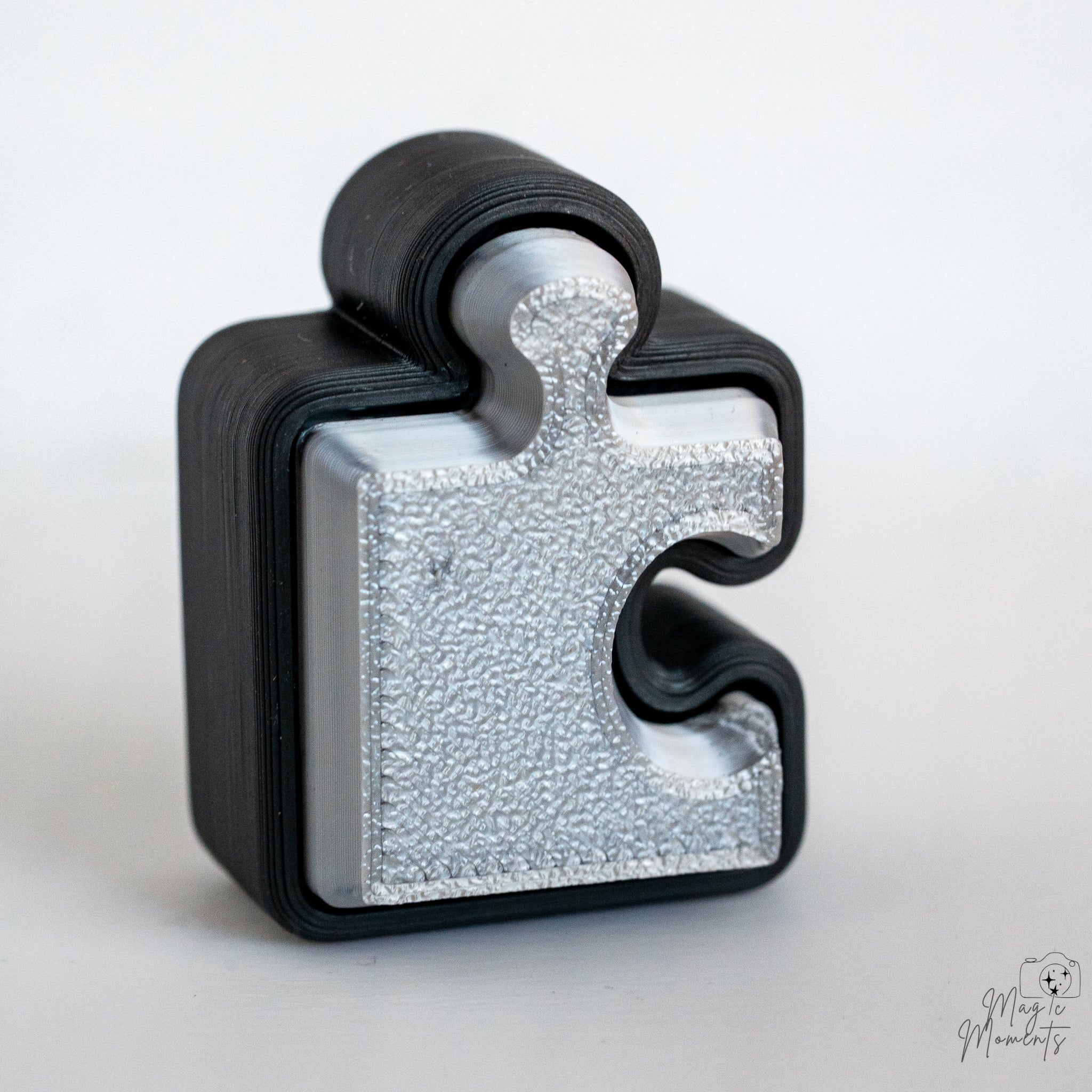 silver puzzle piece clicker