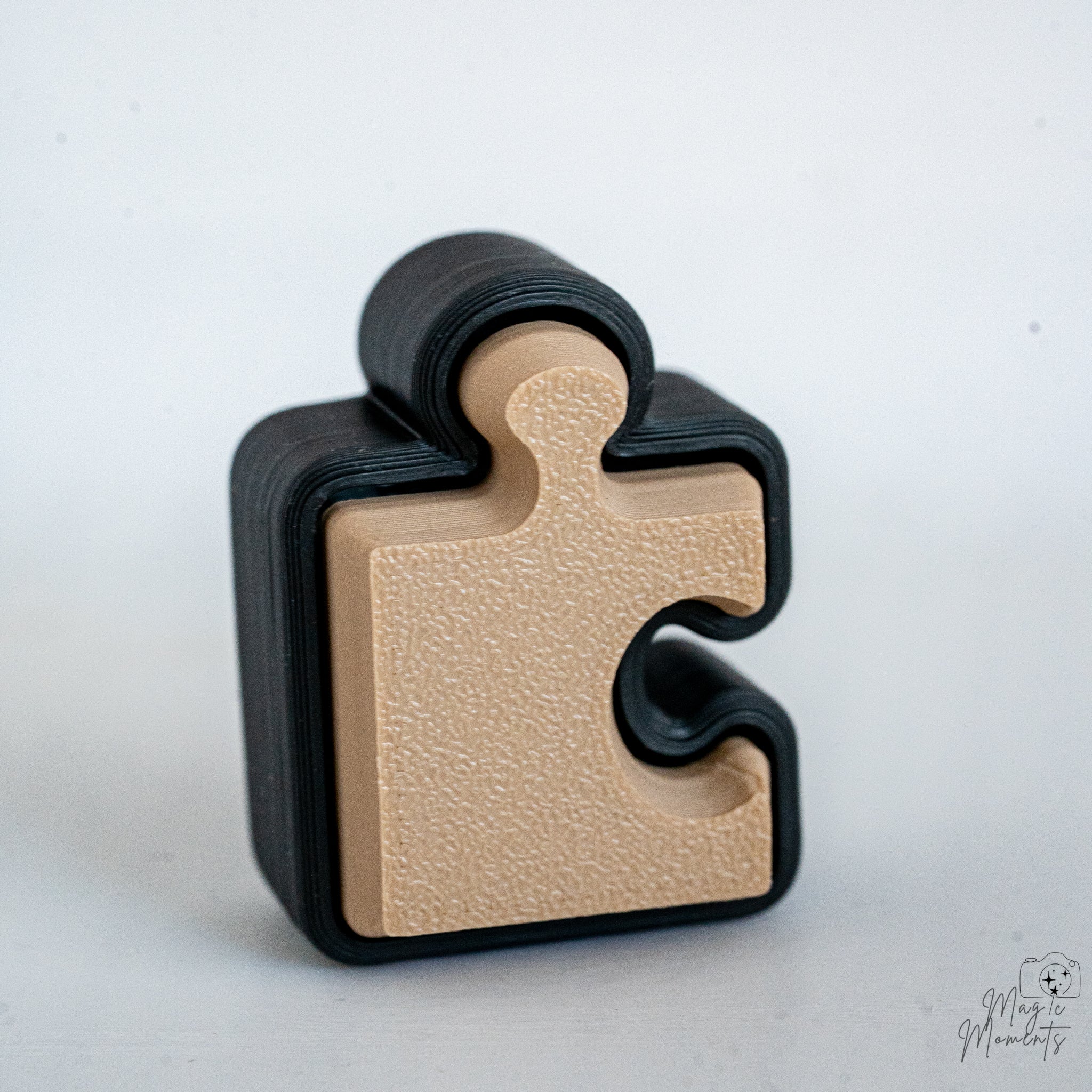 beige puzzle piece clicker keychain