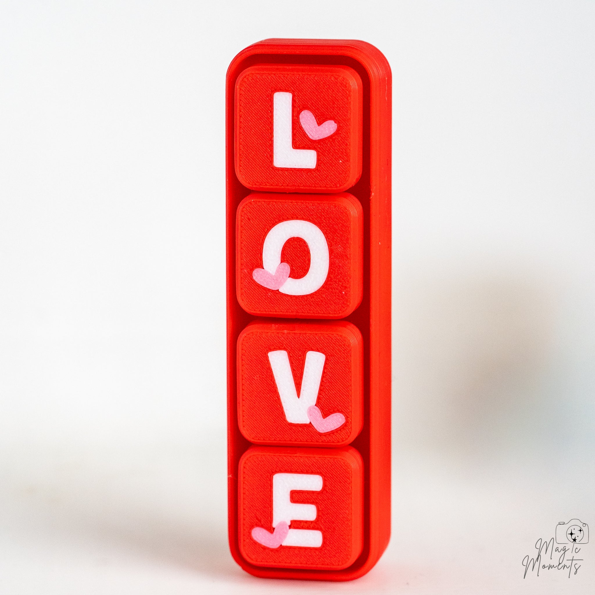 Vertical LOVE clicker with bold red and white lettering