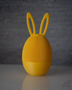 Yellow bunny ear Easter egg container with Easter themed design