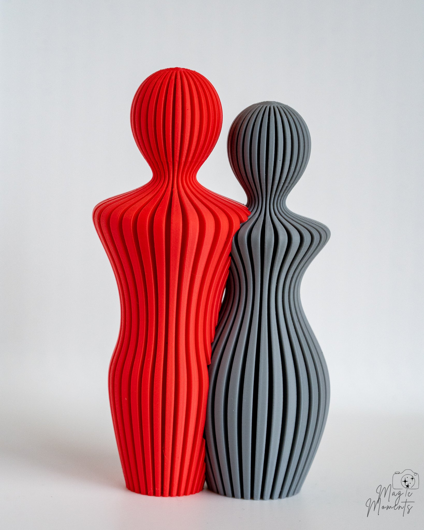 Red and grey couple sculpture set with artistic modern style