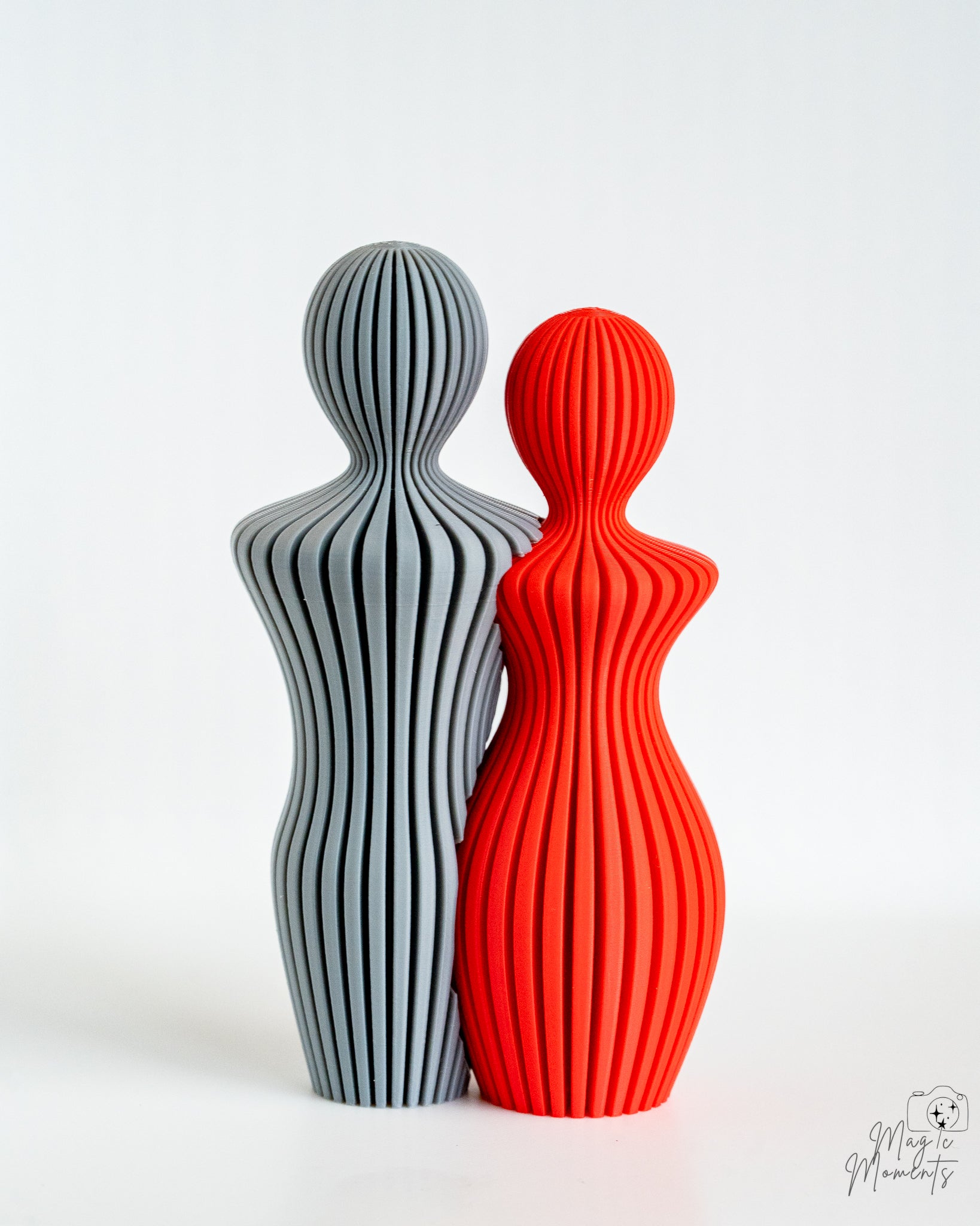 Grey and red abstract couple figures with modern artistic design