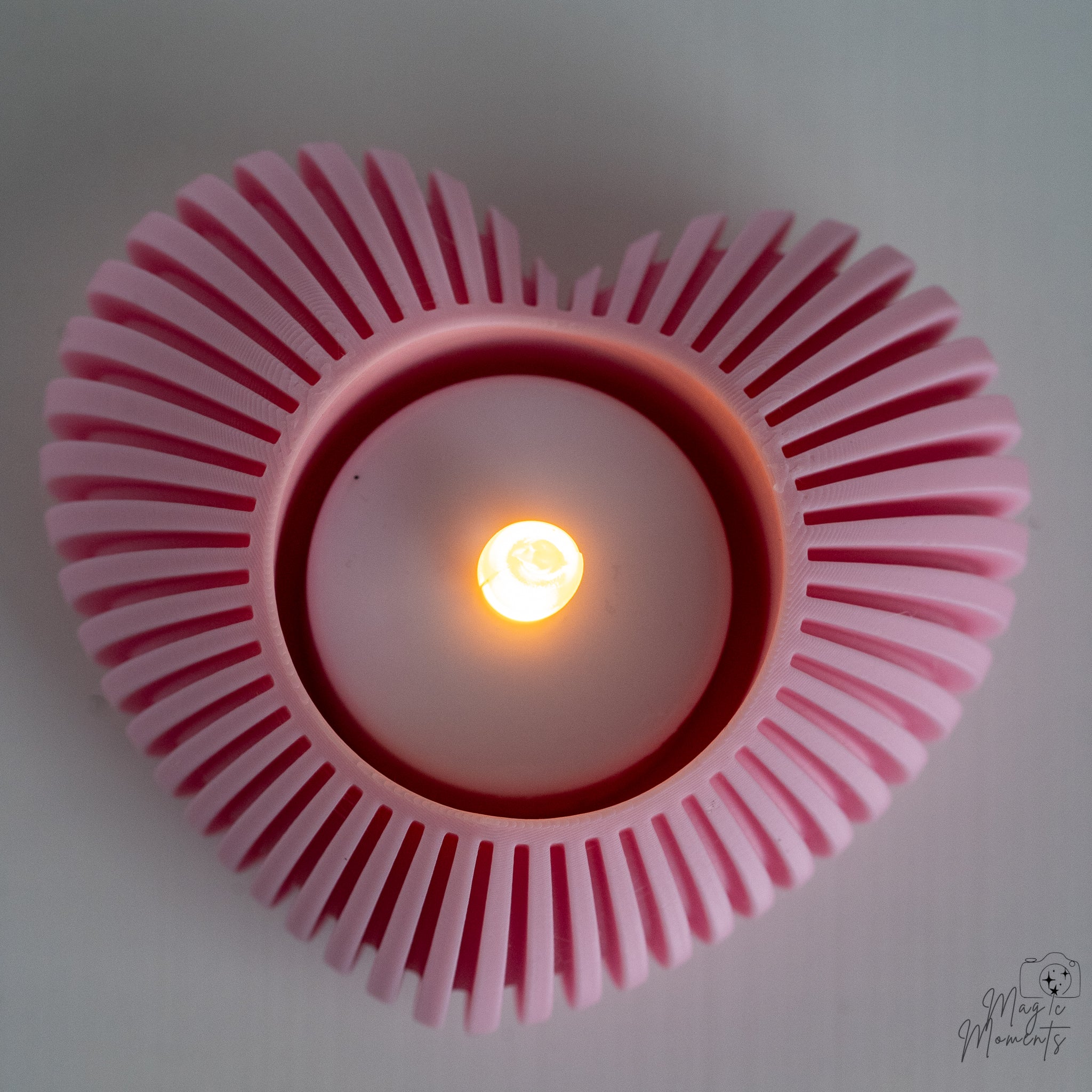 Pink heart tealight holder with layered spiral heart shape