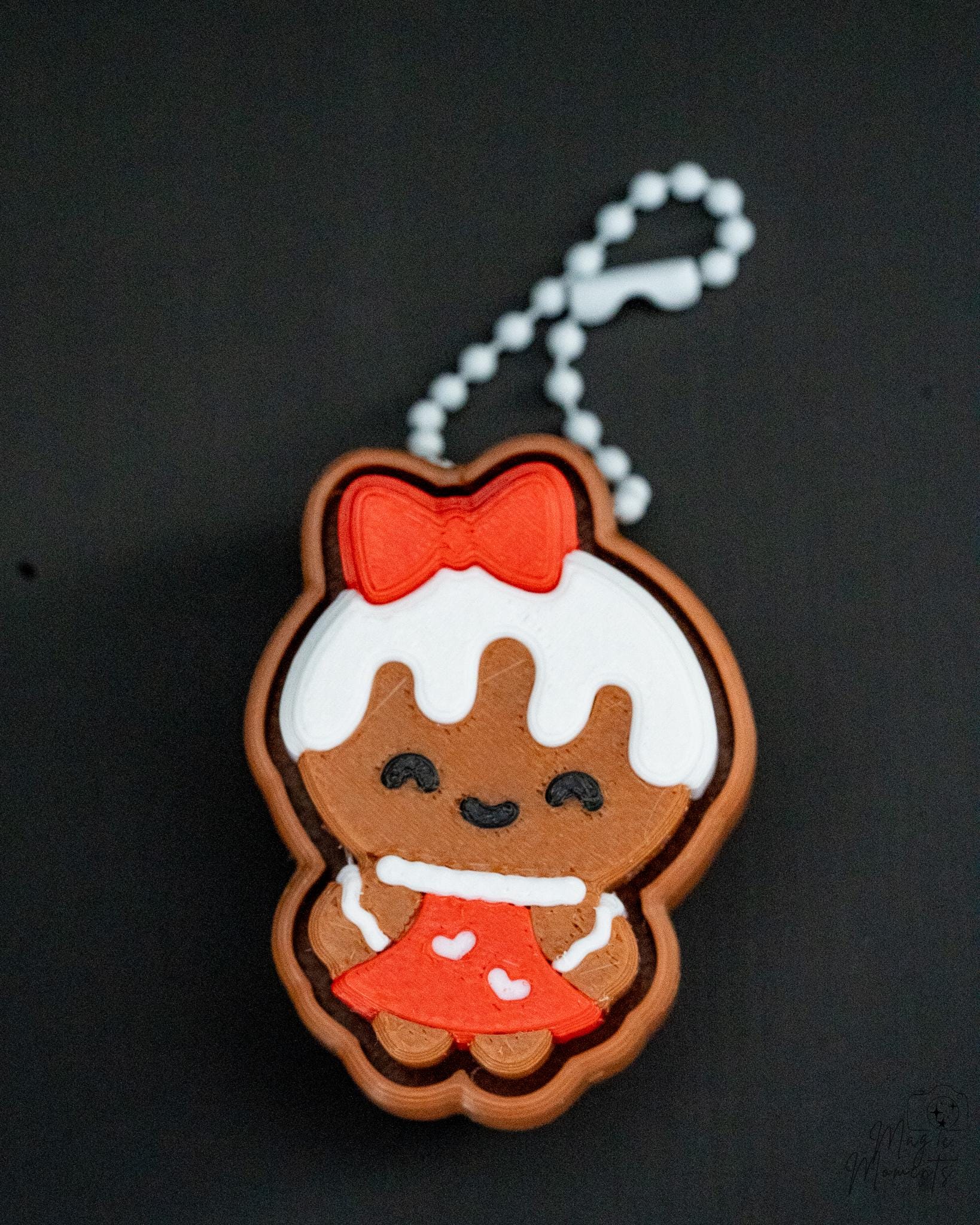 Gingerbread girl clicker with red bow keychain