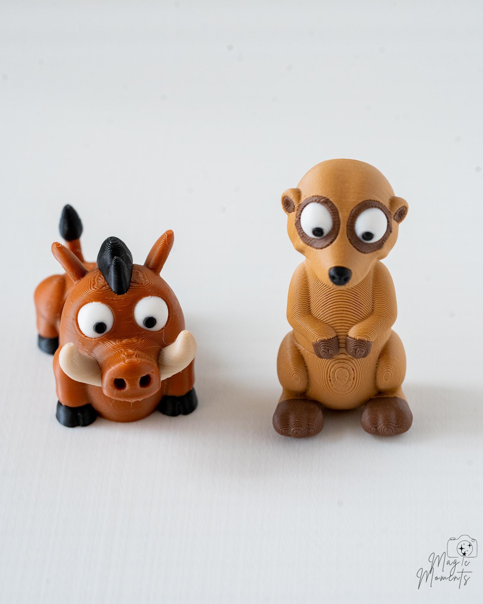 meerkat and warthog mini figurines