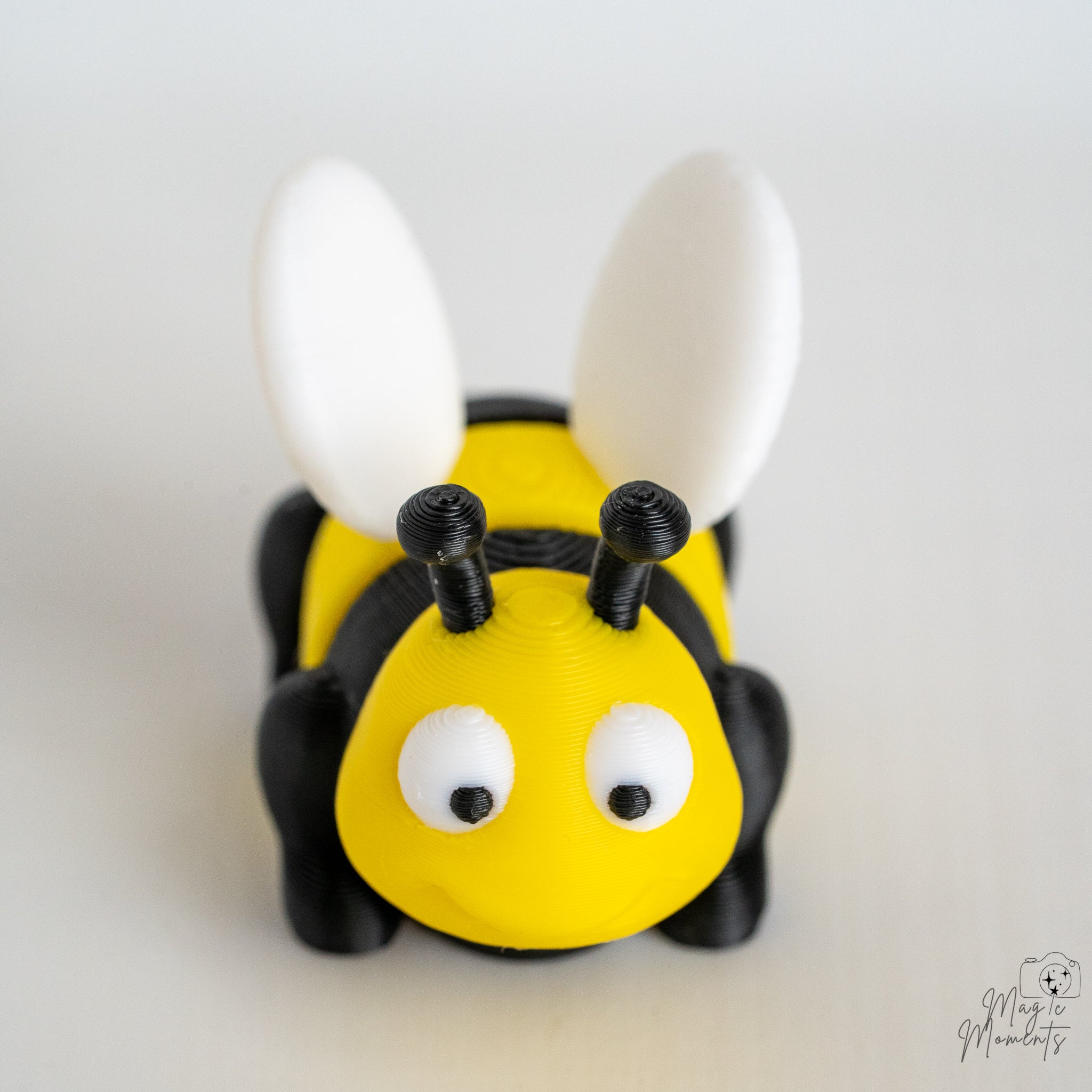 Front view of bee decorative figure