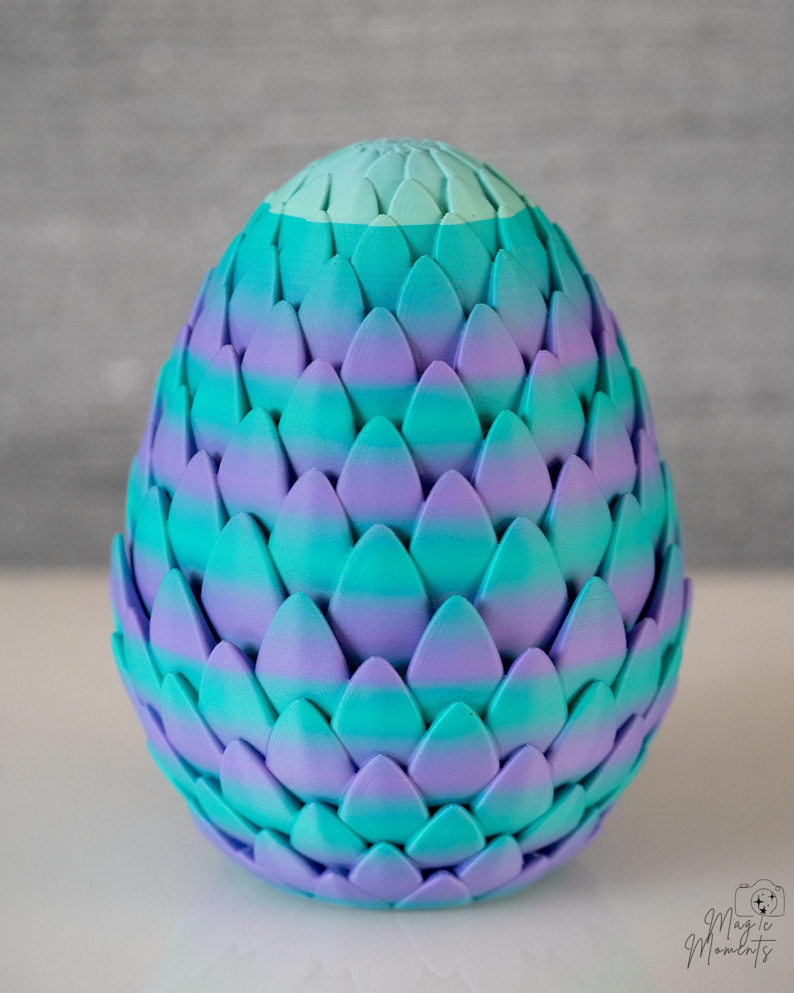 turquoise and purple dragon egg container