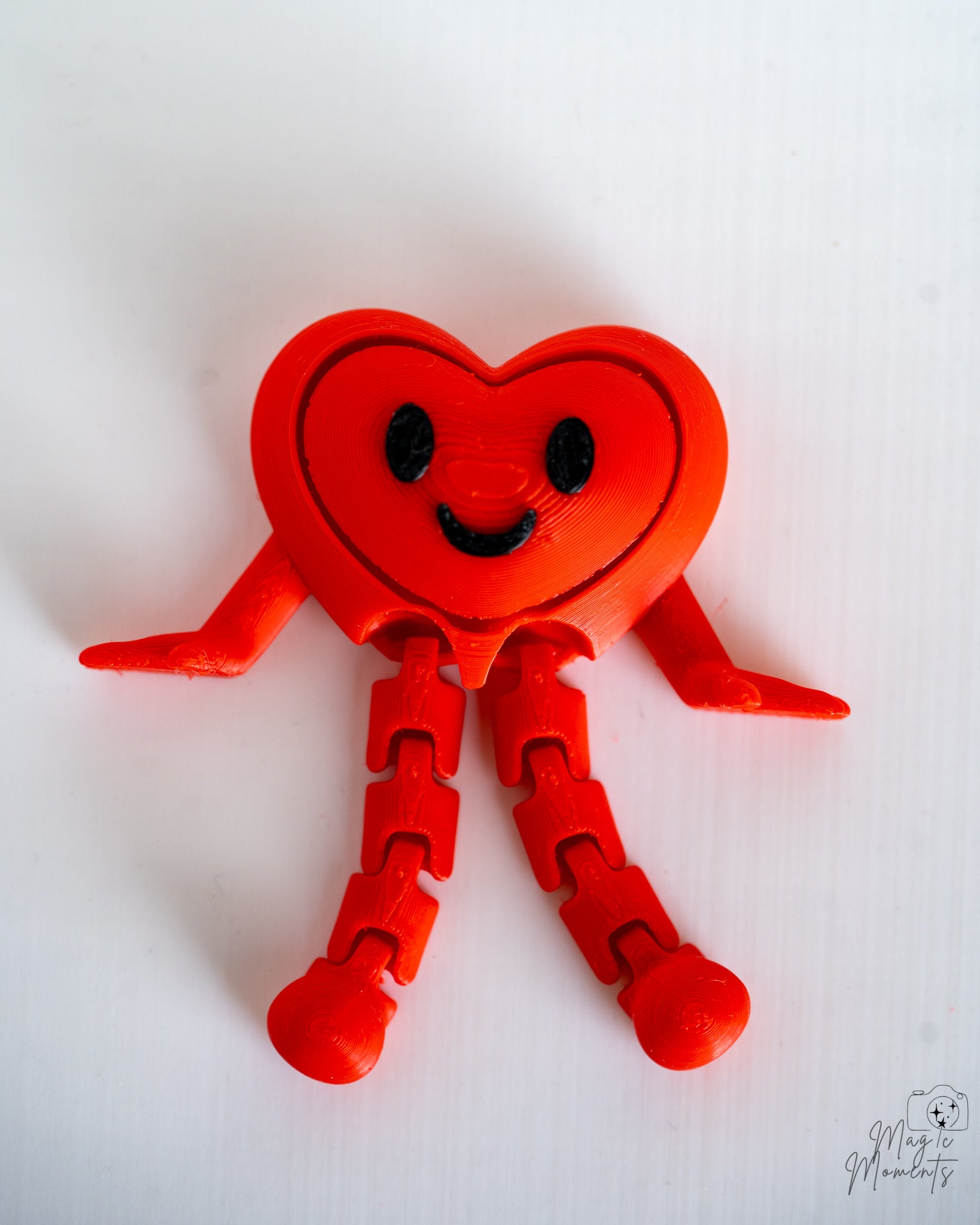 Cute red heart clicker fidget with articulated legs 3D printed Valentine gift