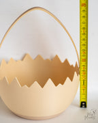 Easter egg basket next to measuring tape for scale