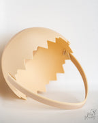Minimalist egg basket with zigzag cracked shell design