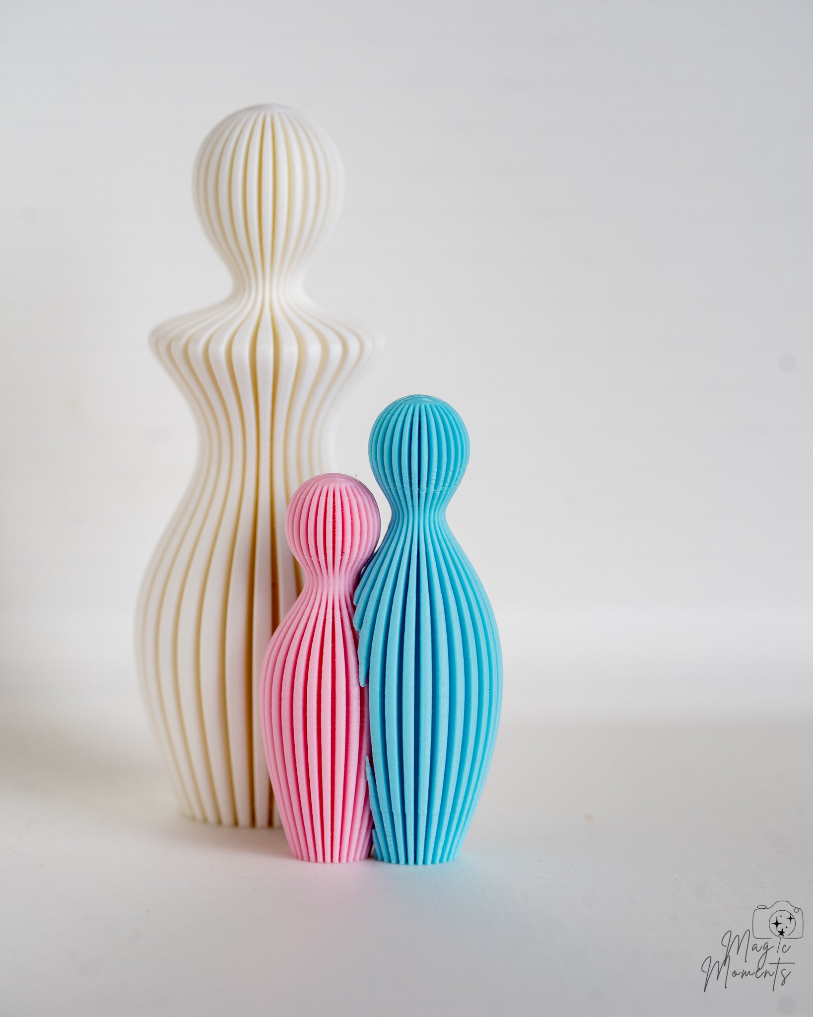 Minimalist family sculptures grouped together
