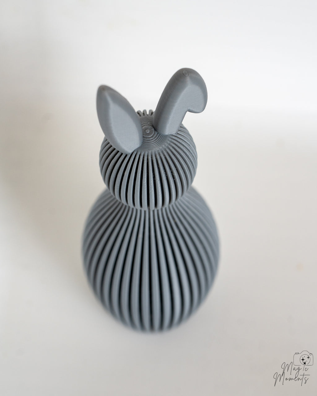 Grey bunny decorative figure viewed from above
