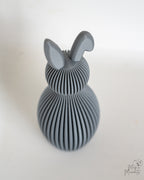 Grey bunny decorative figure viewed from above