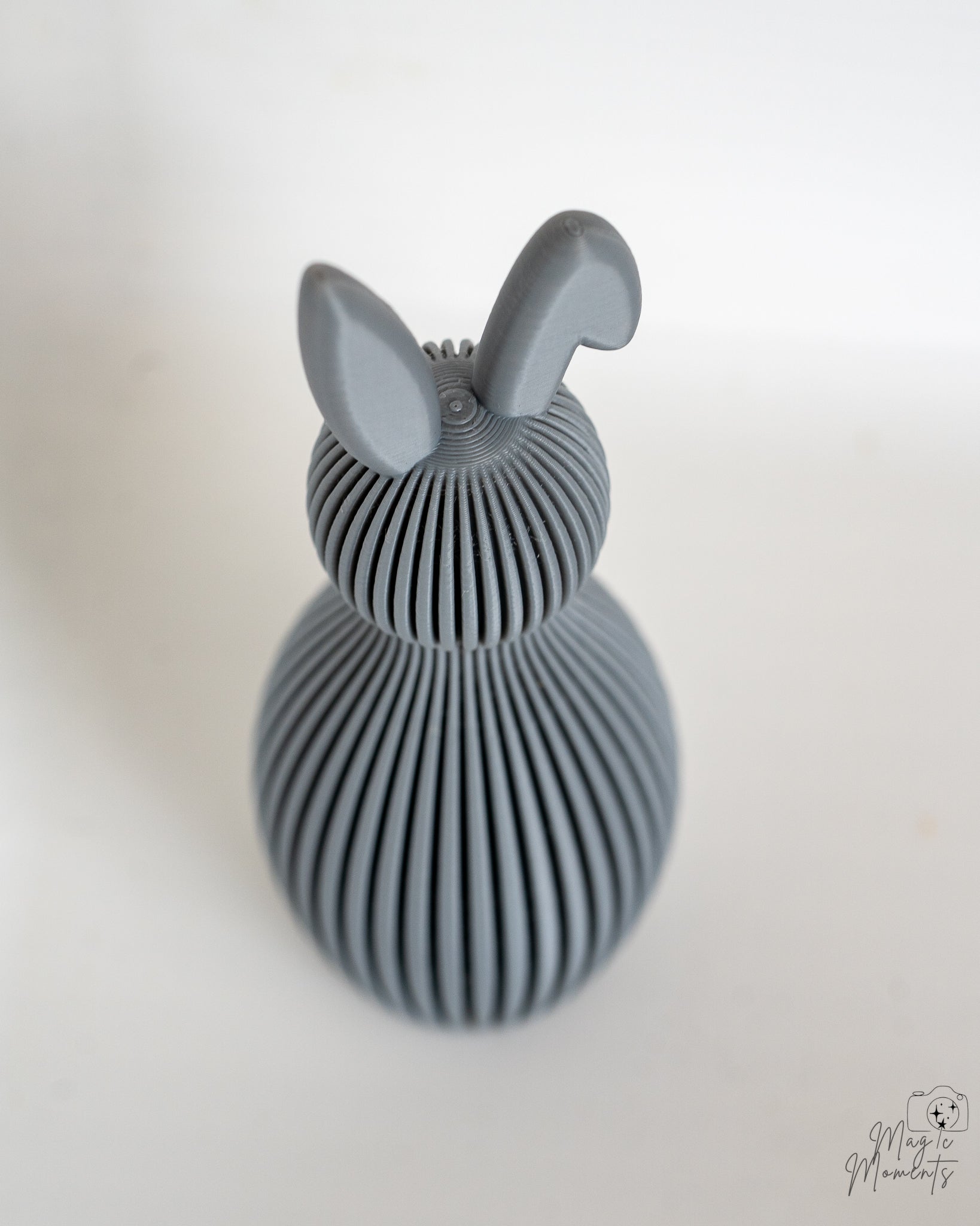 Grey bunny decorative figure viewed from above
