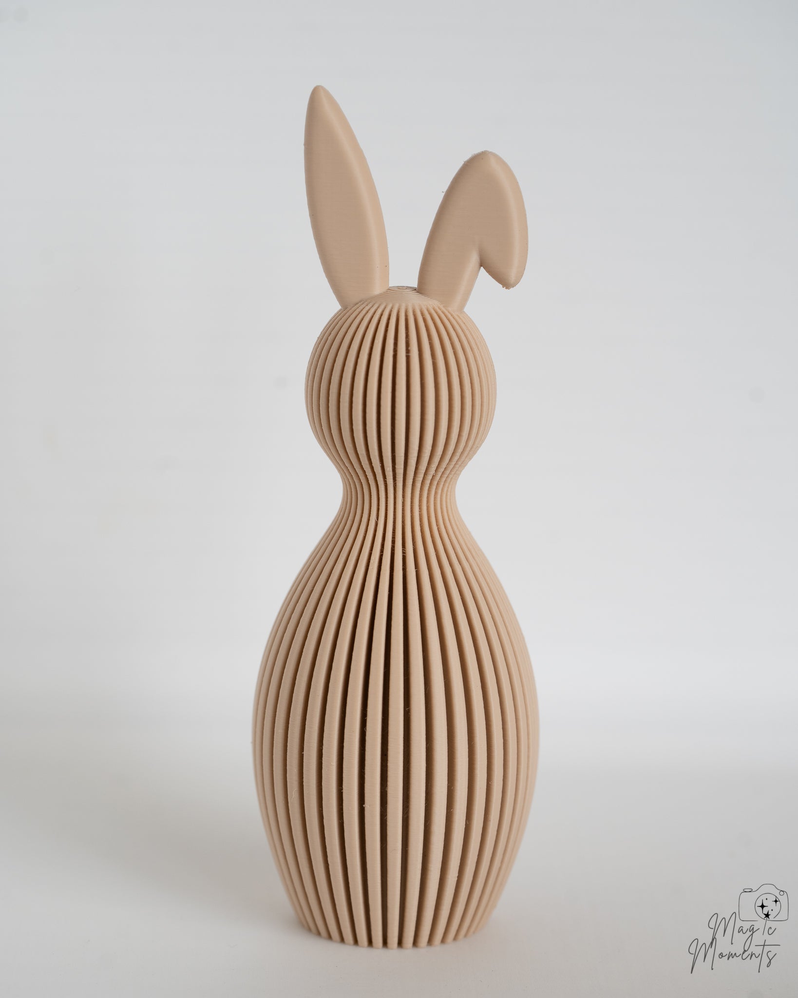 Beige bunny decorative ornament viewed from front