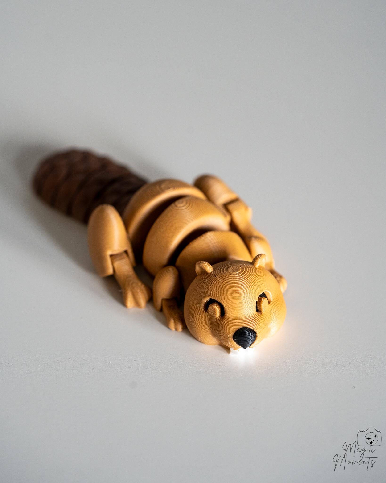 Articulated beaver style animal figure with segmented body
