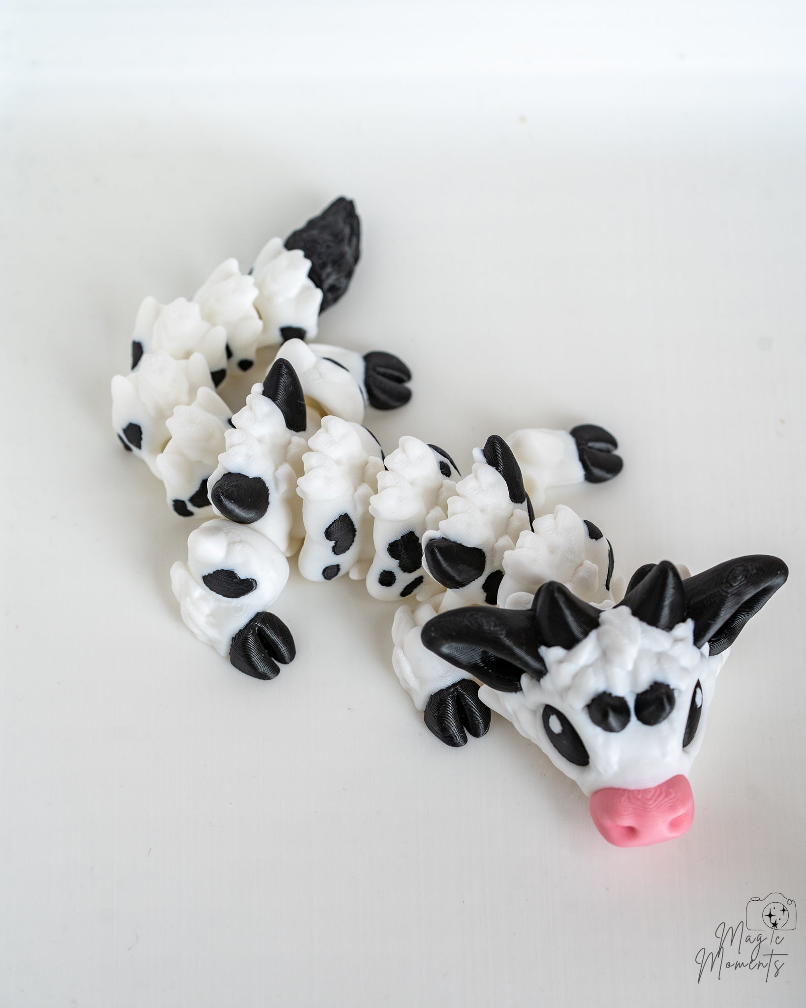 Articulated 3D printed Cow Dragon in black and white cow pattern decorative fantasy dragon 