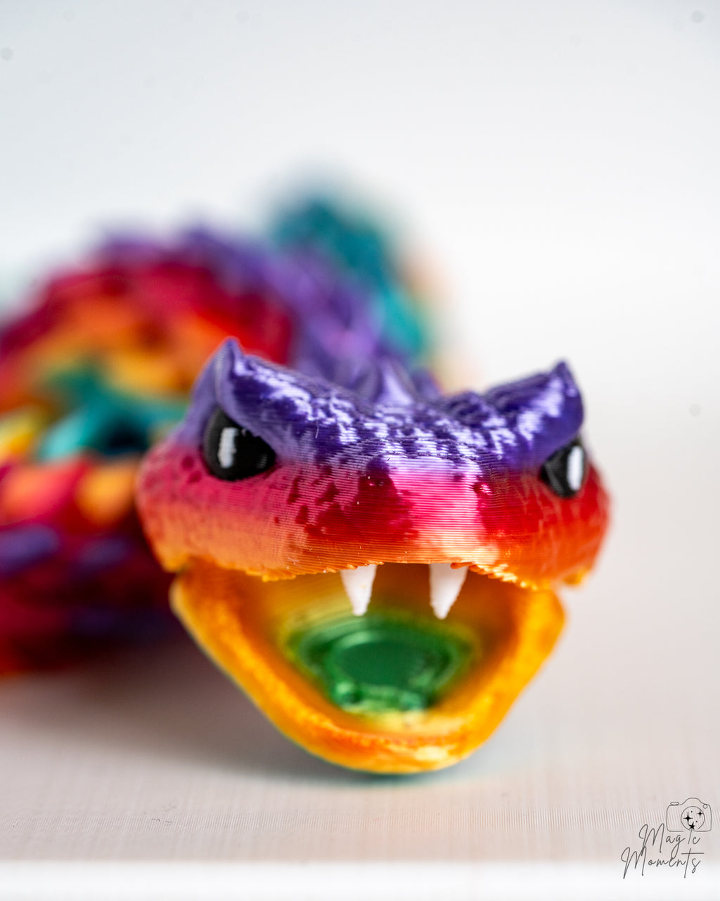 Close up of rainbow snake dragon face with open mouth