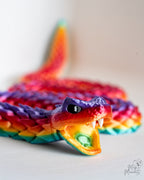 Close up of rainbow snake dragon face with open mouth