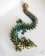 Articulated crystal dragon in blue and gold colours