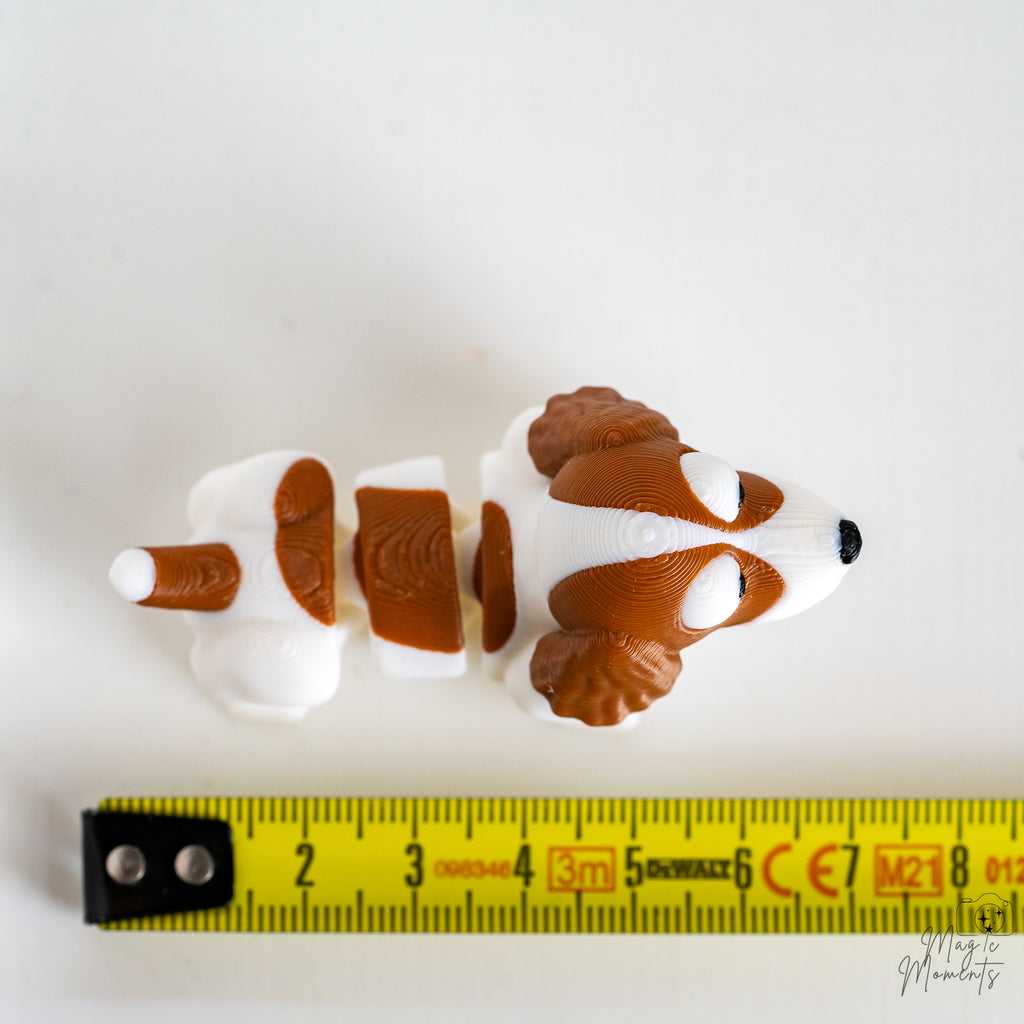 springer spaniel figure next to measuring tape for scale
