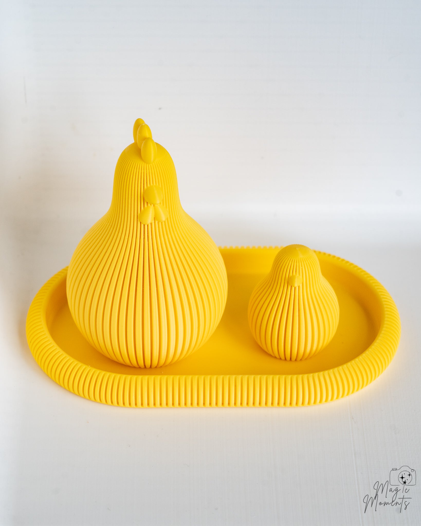 Yellow ribbed chicken figures on tray