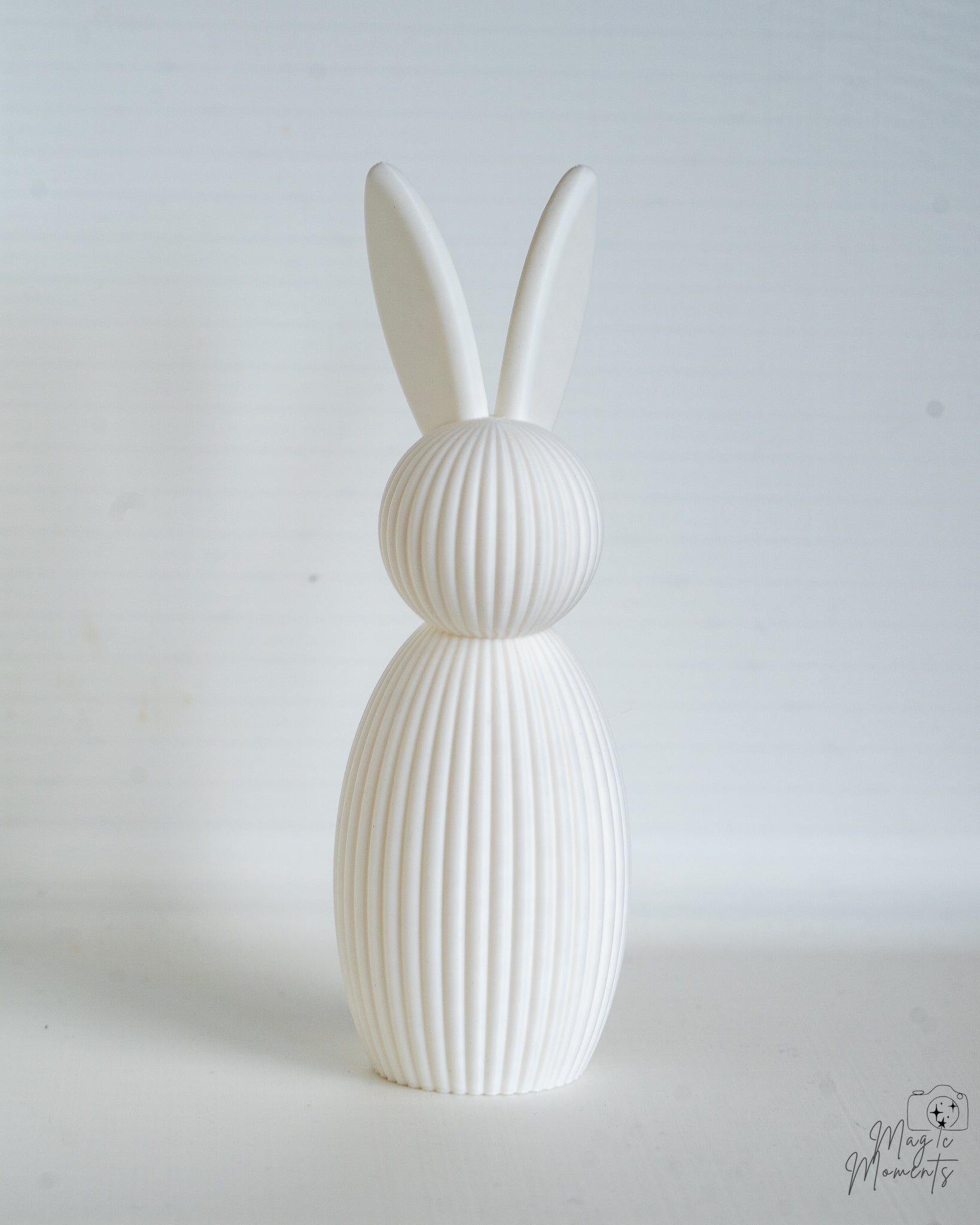 White bunny decorative figure viewed from front