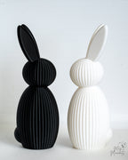 Modern ribbed bunny decor figures in black and white