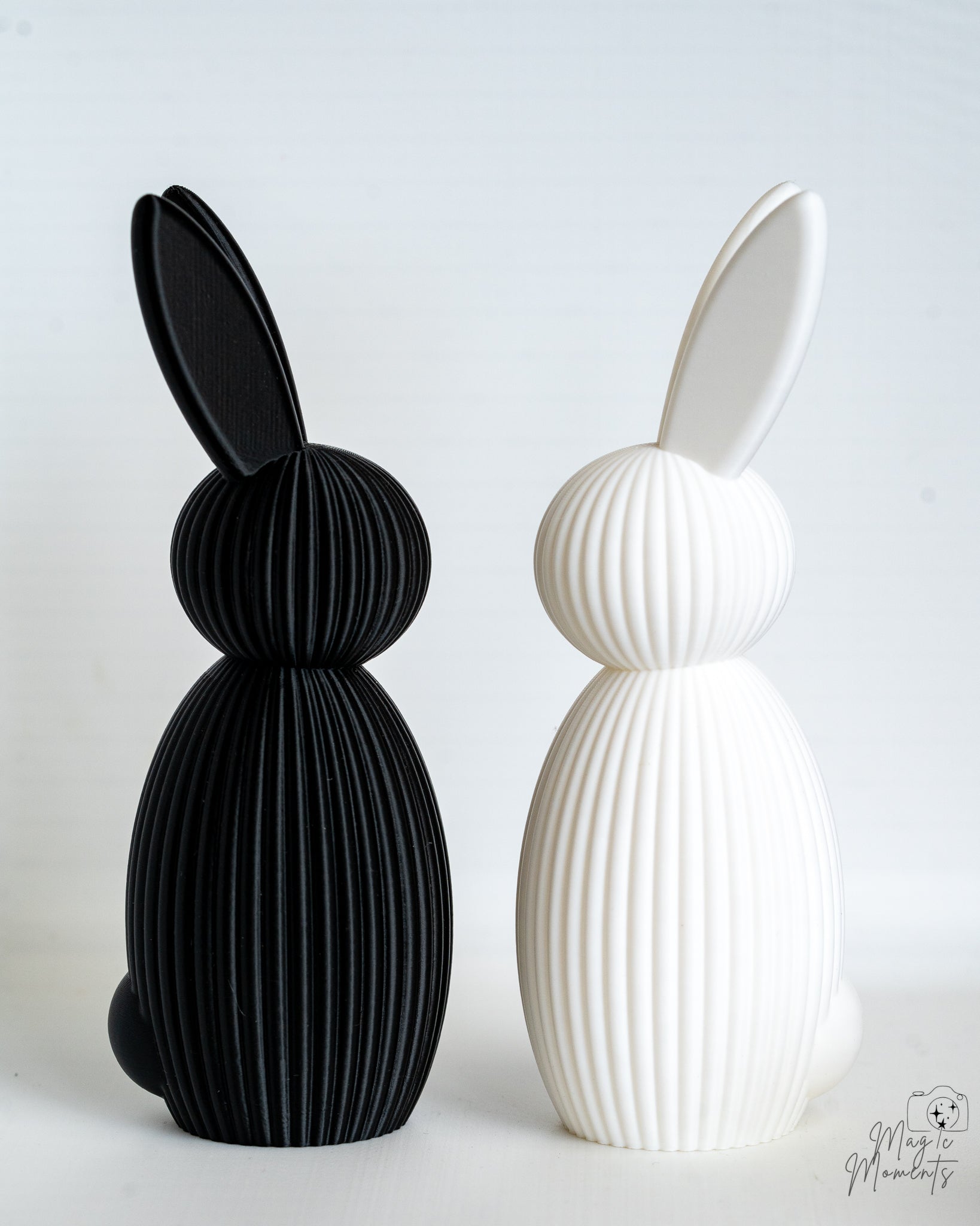 Modern ribbed bunny decor figures in black and white