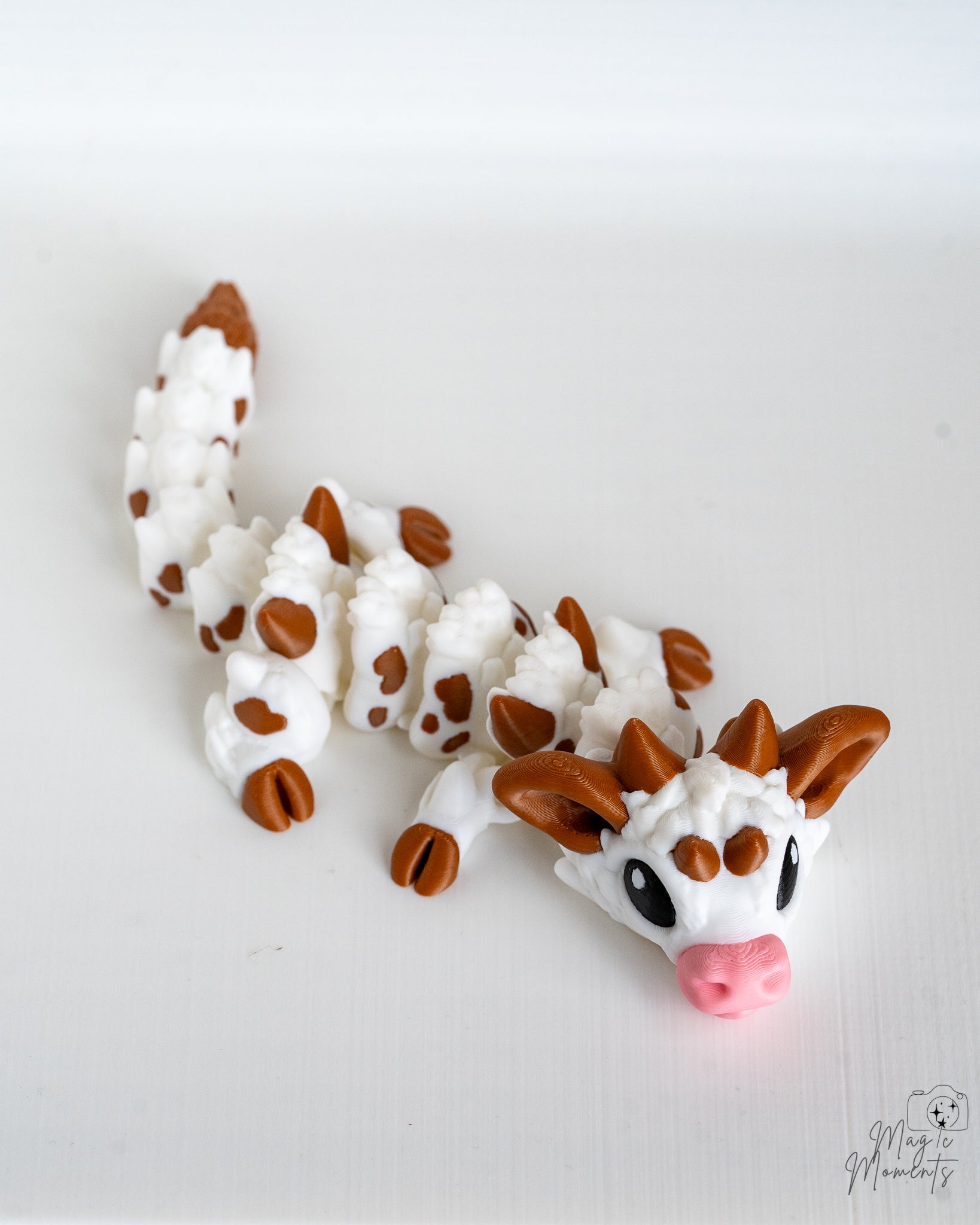 Articulated 3D printed Cow Dragon in brown and white cow pattern decorative fantasy dragon 
